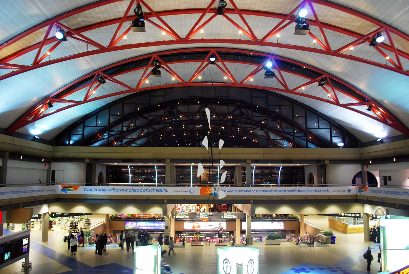 An early morning view of the Pittsburgh International Airport Airside Terminal core from the mezzanine level. Alexander Calder's Pittsburgh mobile is visible in the center of the image.